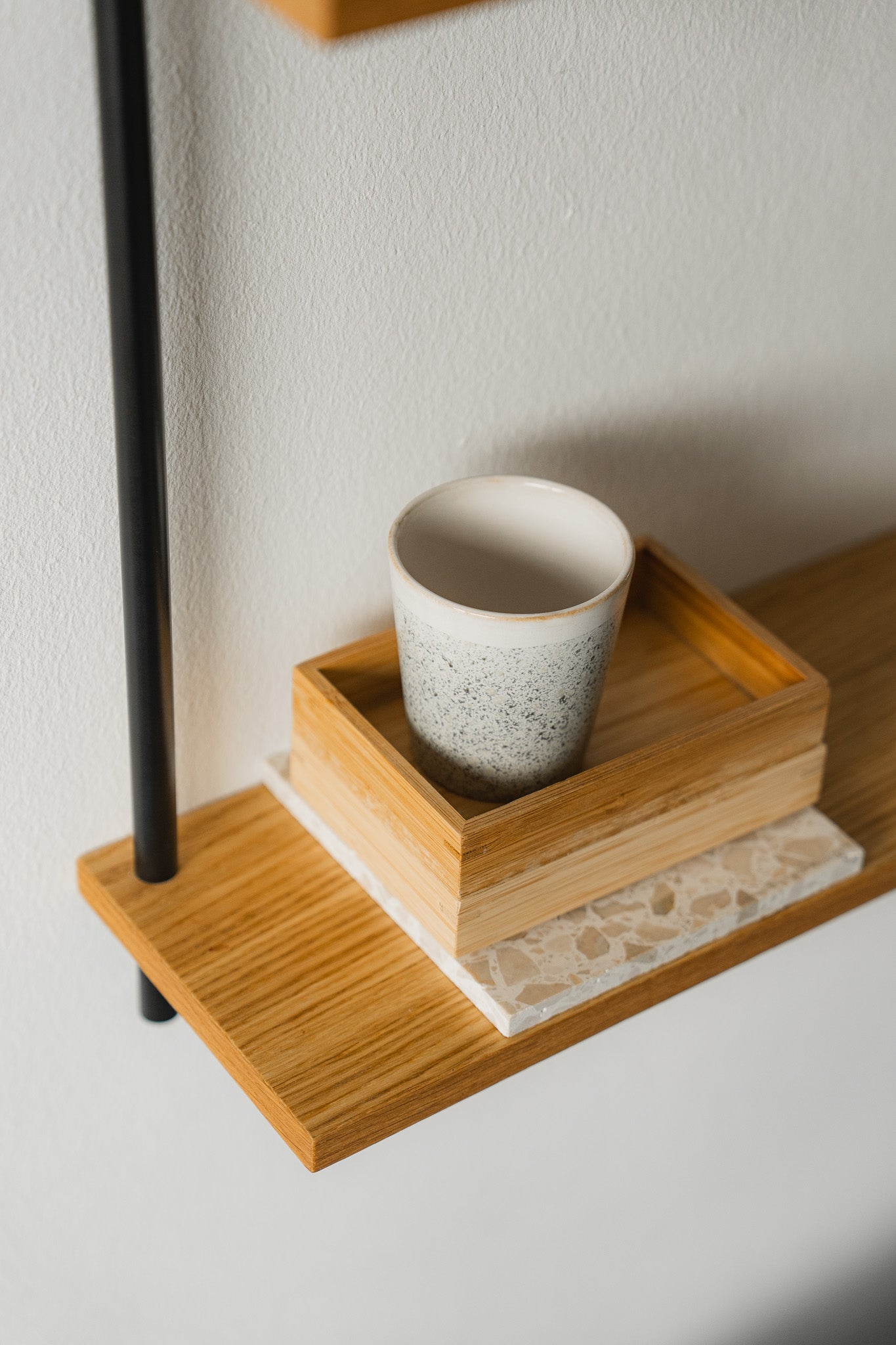 Floating oak hanging wall shelf — KUUDU modular shelving system for living room and bedroom